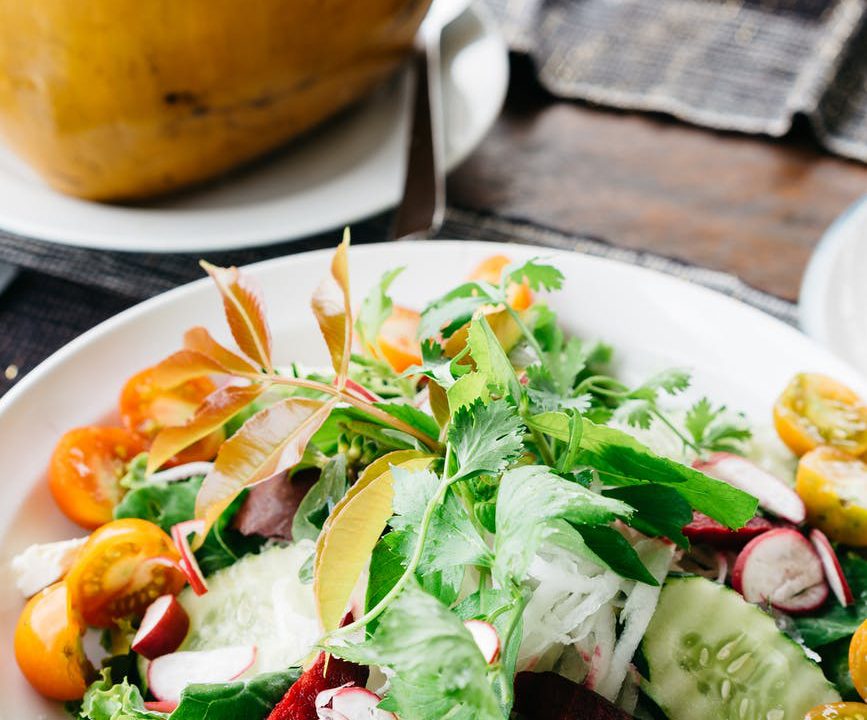 vegetable salad on white plate